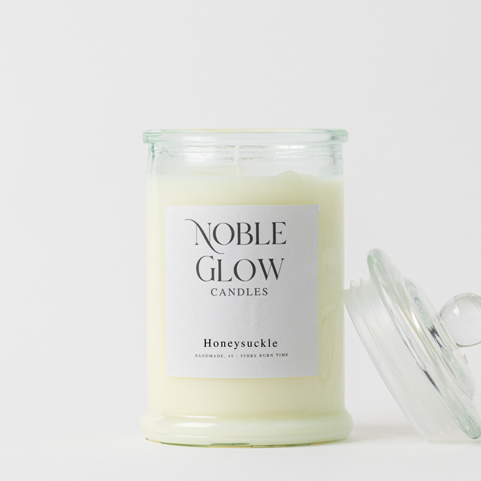 Noble Glow Candles Honeysuckle candle on a white background