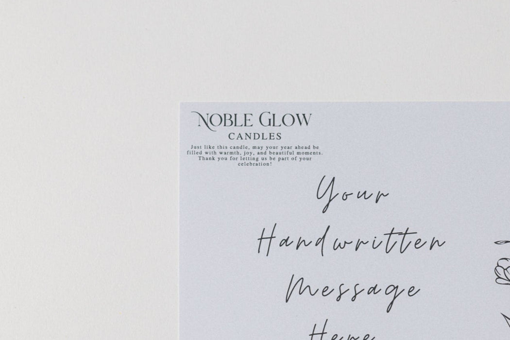 Noble Glow Candles packaging with a customizable message section on a light gray background